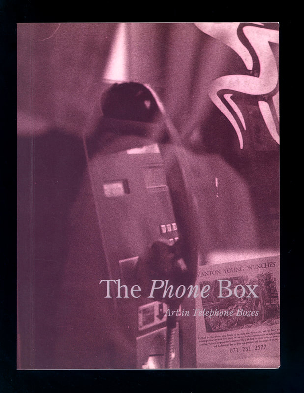 Fuschia toned photo from the publication cover, showing a close up of a public phone headset and mechanism and the former BT 'piper' logo. One of Damien's cards can be seen in the bottom right corner.